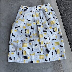Vintage 1980s does the 60s / 50s yellow and white geometric print midi skirt